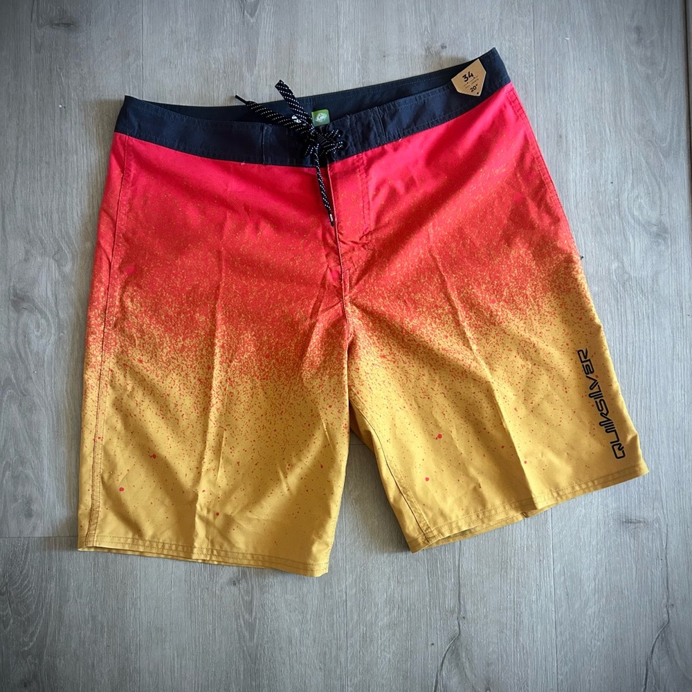 BRAND NEW! Men’s Quiksilver Red and Yellow Board Shorts size 34